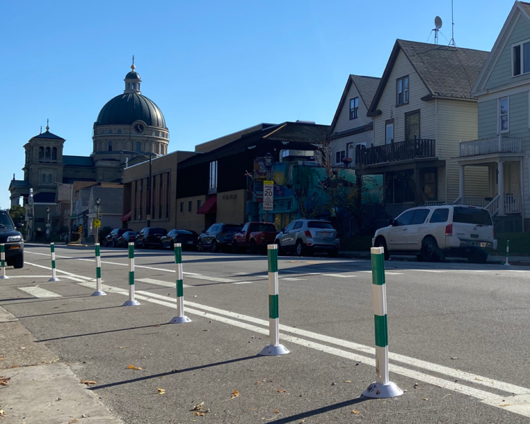 Lincoln Avenue with newly installed bollards at a crosswalk