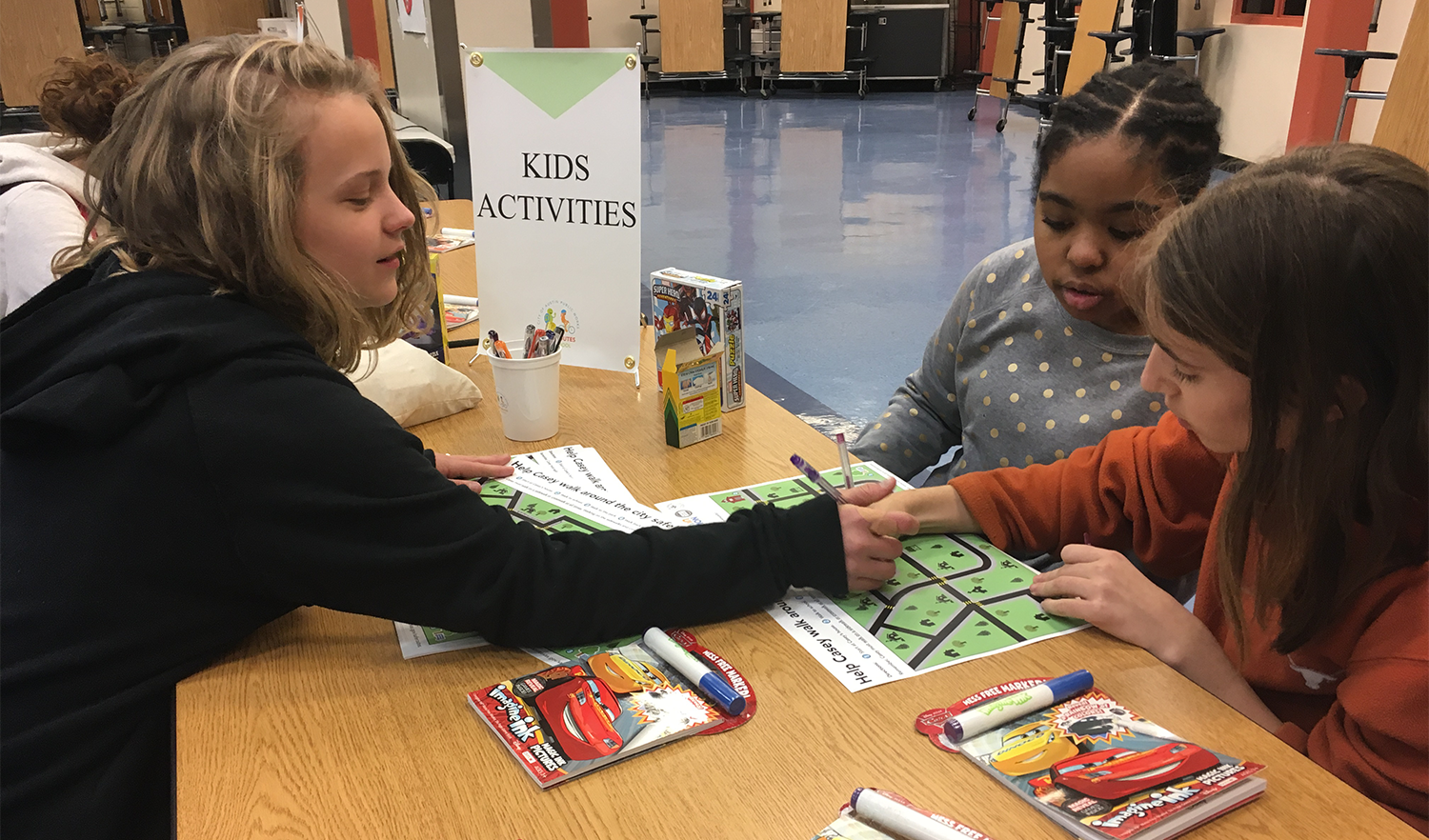 Elementary-age students participate in public engagement efforts for the Austin Safe Routes to School Infrastructure Plan.