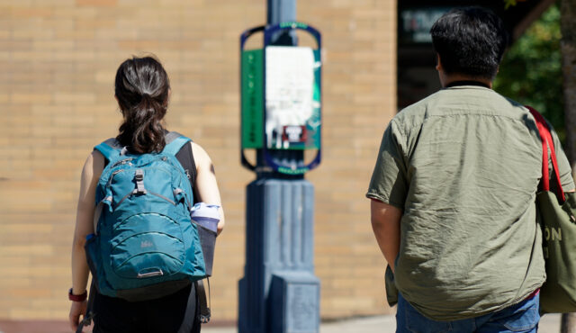 Anabel Jiang and Tyler Carriaga on-site in Bremerton, WA to take photos of installed wayfinding signage.