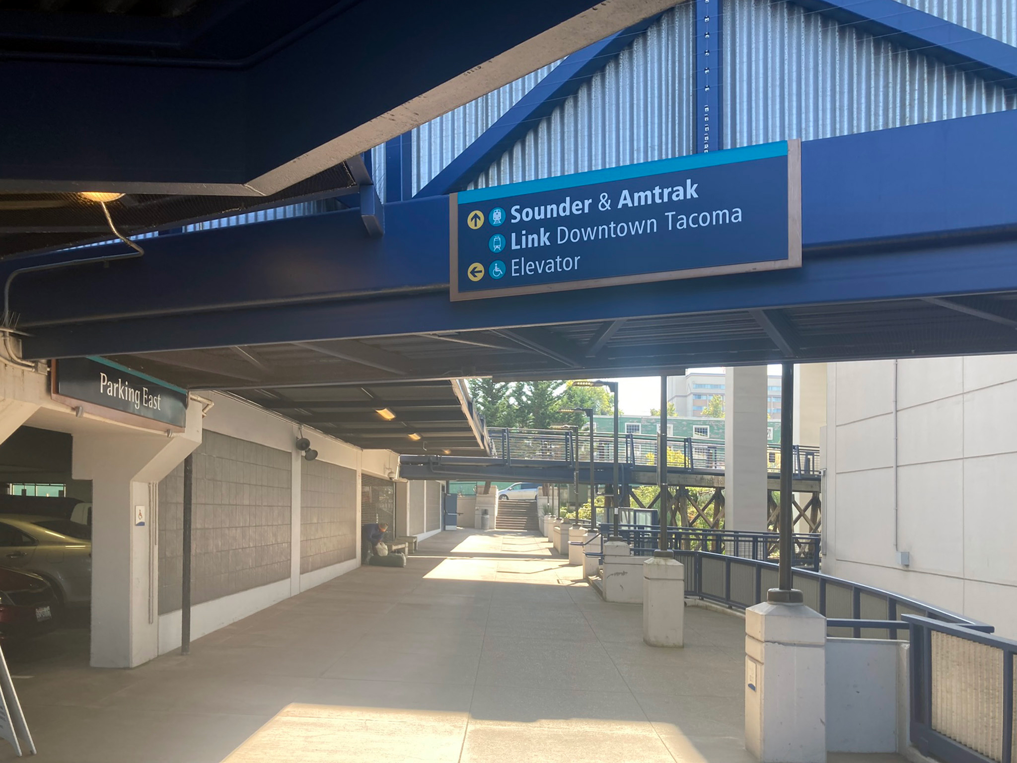 A photo of the existing wayfinding in Tacoma Dome Station's central corridor.